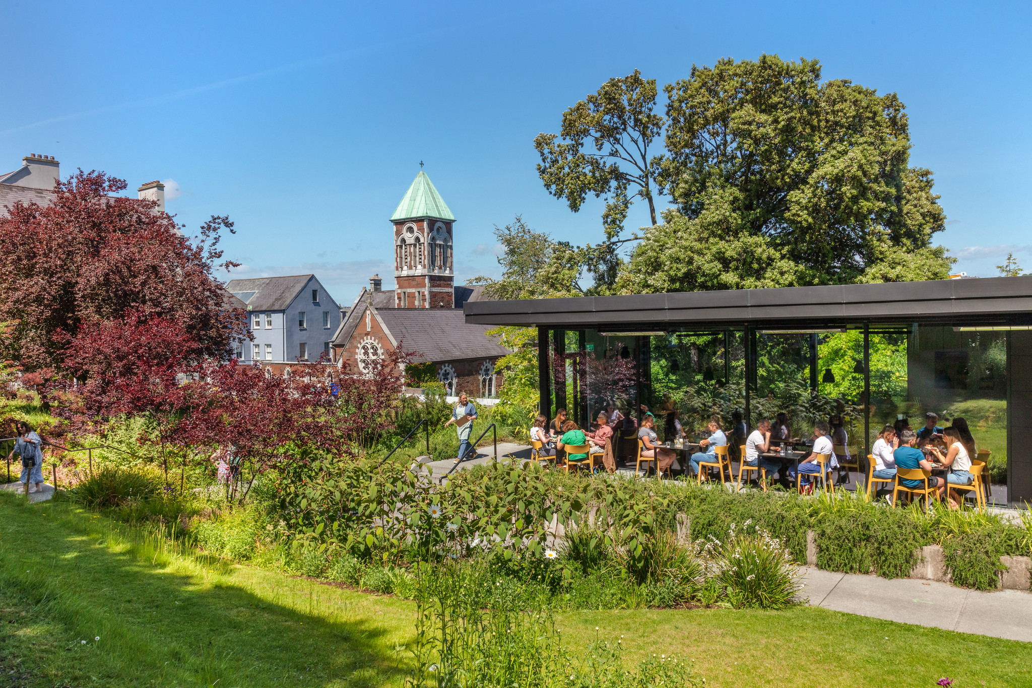 Good Day Deli dining room surrounded by the gardens of Nano Nagle Place in Cork